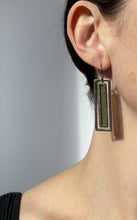 Load and play video in Gallery viewer, LONG OLIVE ATRIUM EARRINGS

