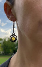 Load and play video in Gallery viewer, LIGHT AMBER ECLIPSE PENDULUM EARRINGS

