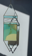 Load and play video in Gallery viewer, LARGE FRENCH VANILLA/TURQUOISE TRIGON SUNCATCHER
